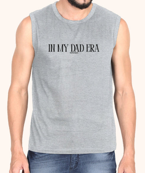 Man wearing a sleeveless gray shirt with text 'IN MY DAD ERA' on a white background