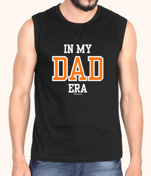 Man wearing a black sleeveless shirt with 'IN MY DAD ERA' text on a white background