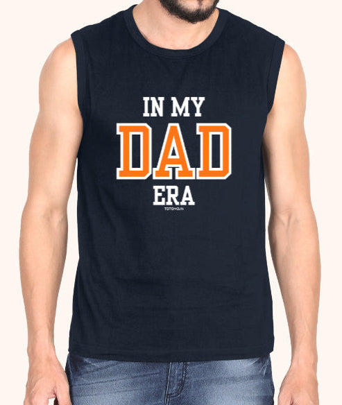 Man wearing a sleeveless black shirt with 'IN MY DAD ERA' text on a white background
