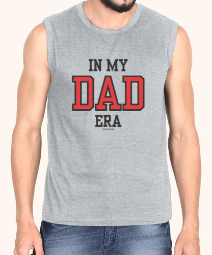 Man wearing a sleeveless gray shirt with 'IN MY DAD ERA' text on a white background