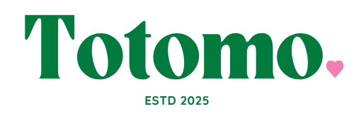 Green 'Totomo' logo with a pink heart on a white background